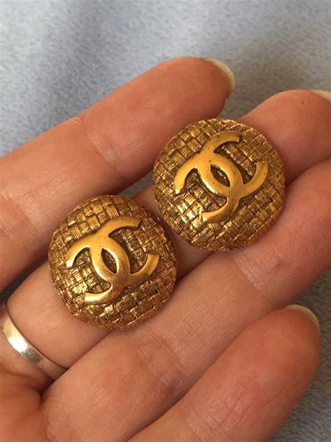 real chanel earrings vs fake|authentic chanel logo earrings.